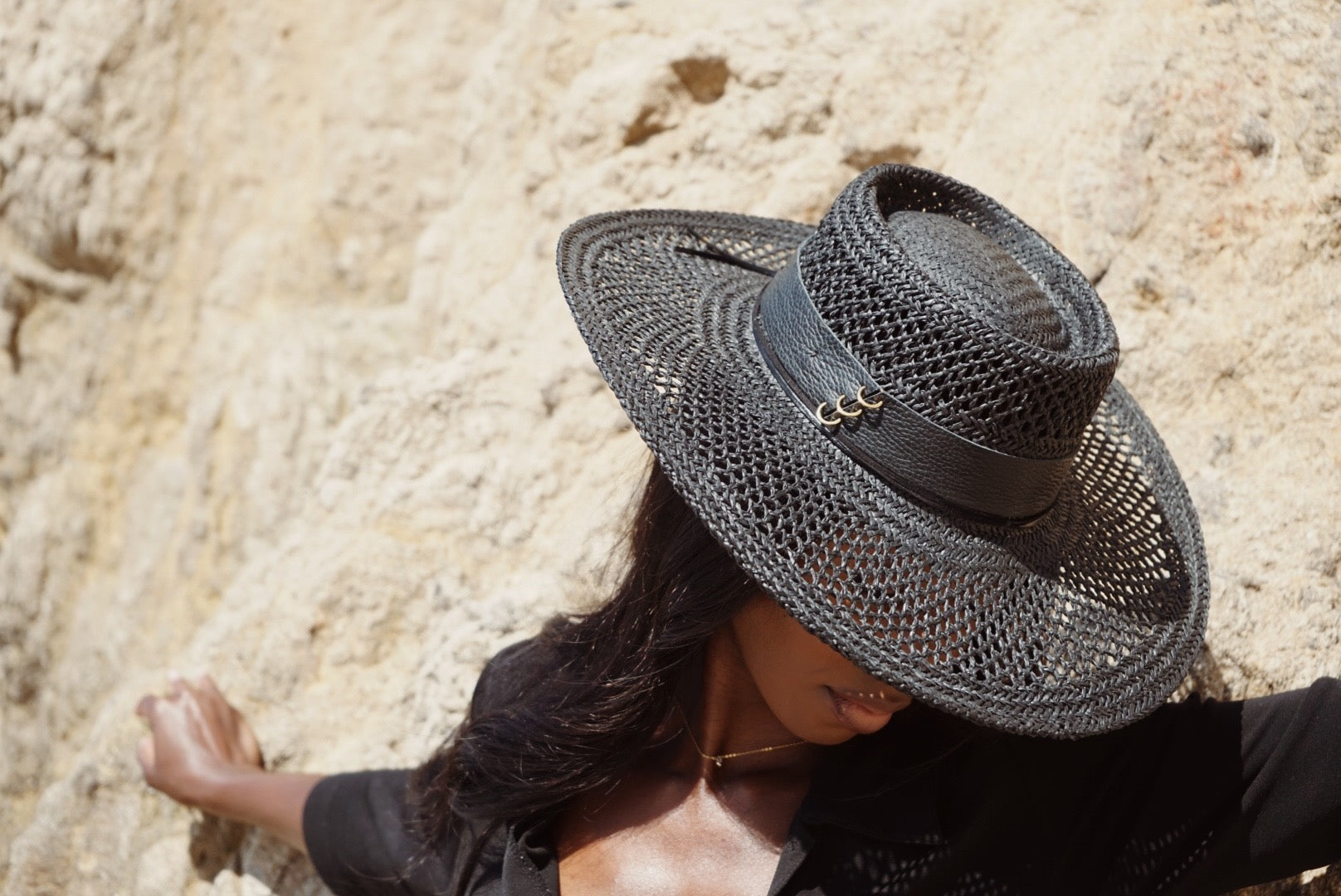 Girl-in-black-straw-hat-cord-knotted