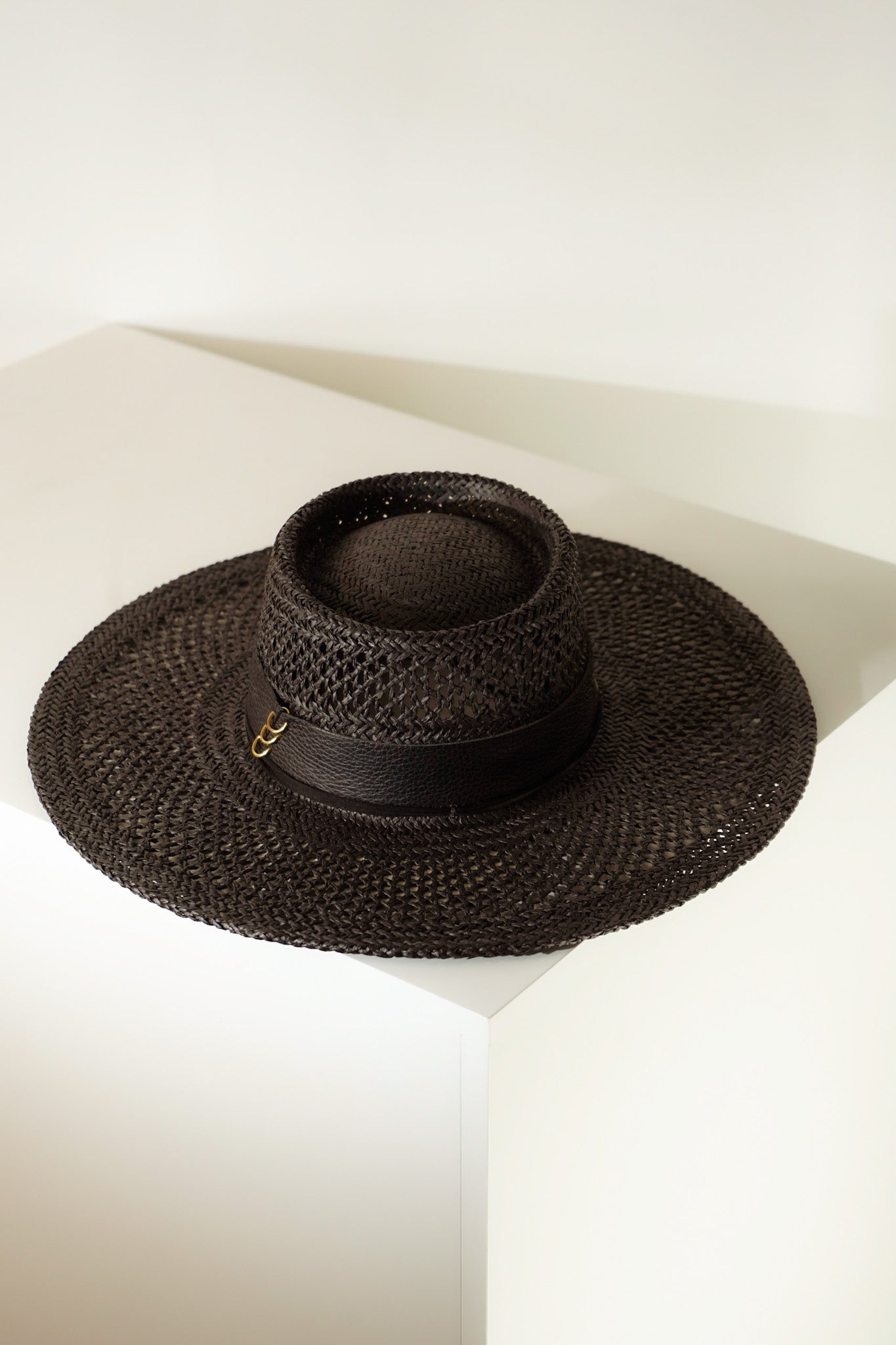 black-wide-brim-straw-hat-cord-knotted